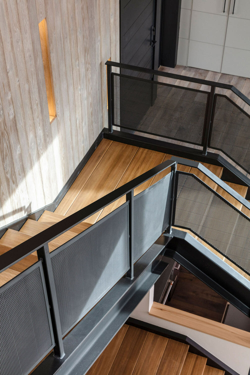 custom metal staircase in a custom mountain home