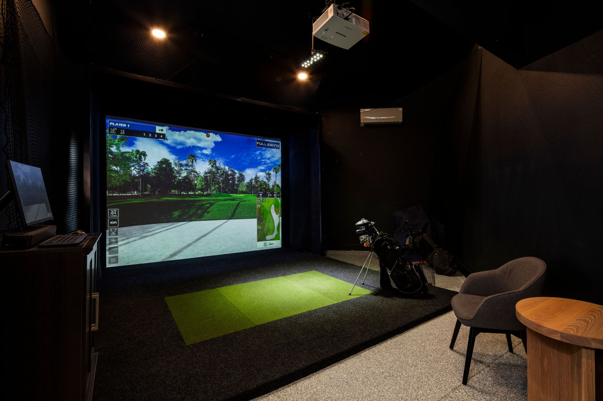 Wildflower Custom Home - golf simulator in the basement