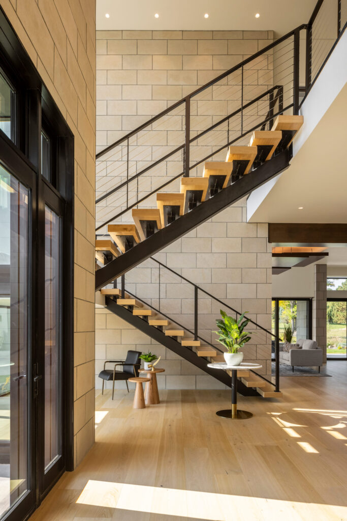 Side view of stairs in custom home remodel, Chateau Brot.