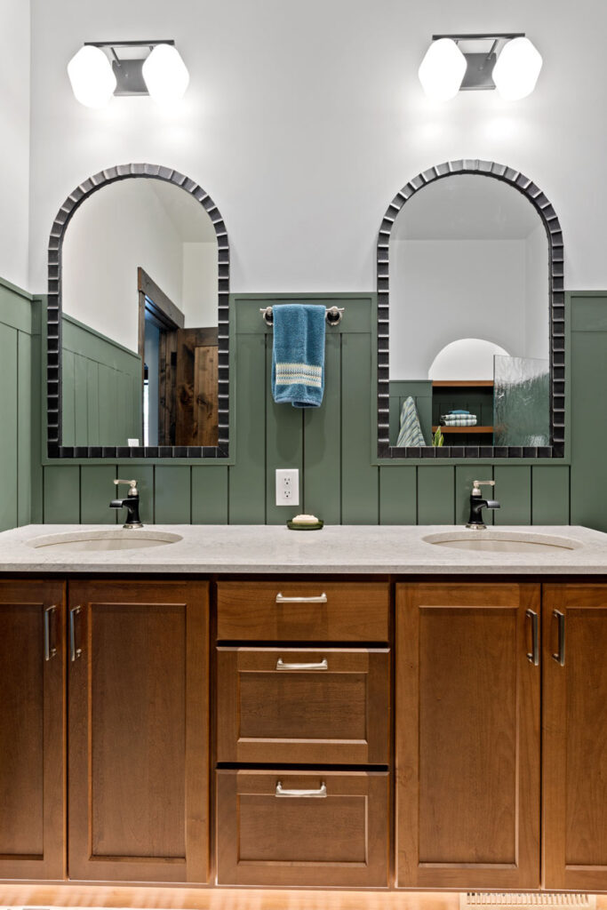 double vanity with green backsplash