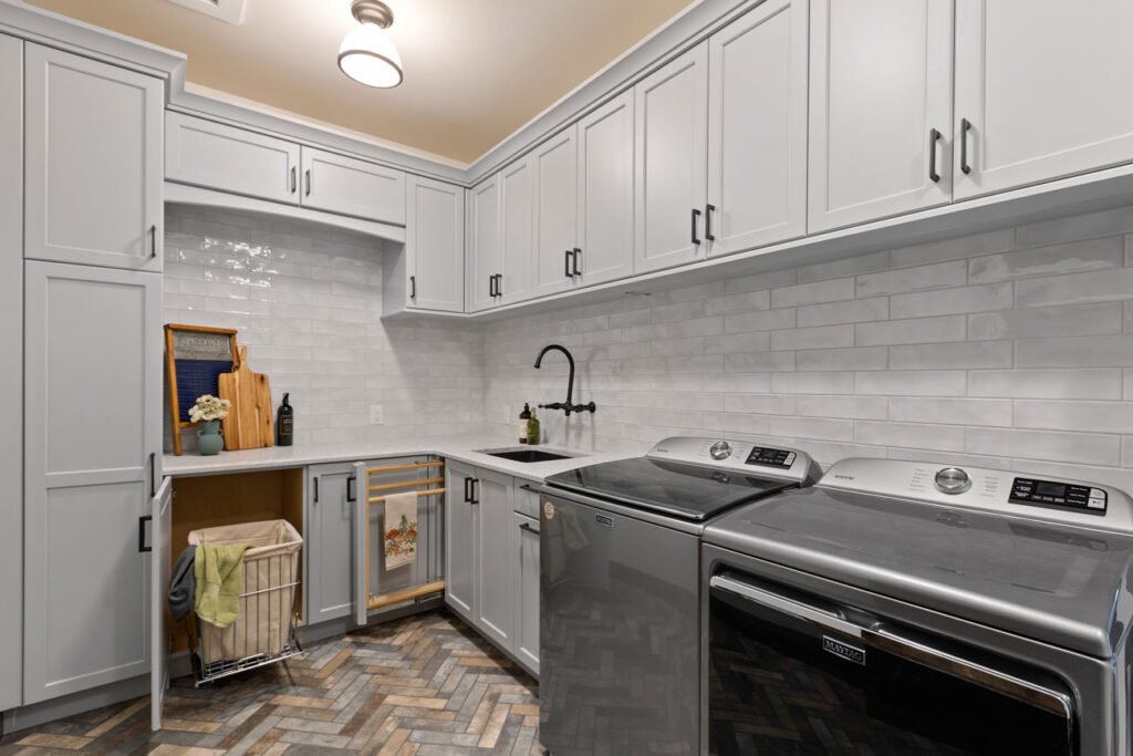 mudroom with laundry and storage