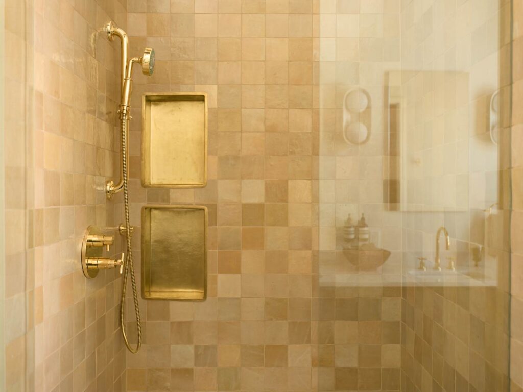 shower tile with gold accents