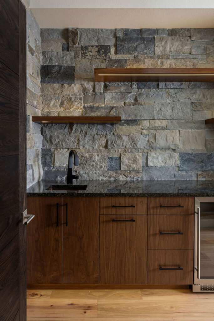 custom kitchenette with floating shelves and LED inset lights