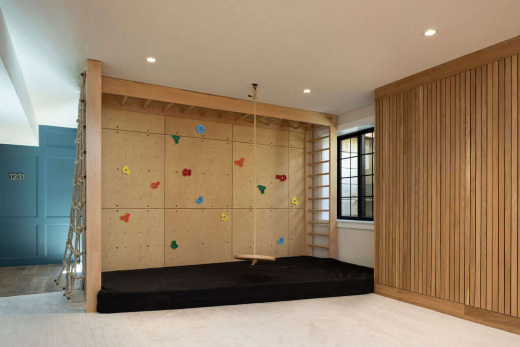 basement remodel with indoor rock climbing wall